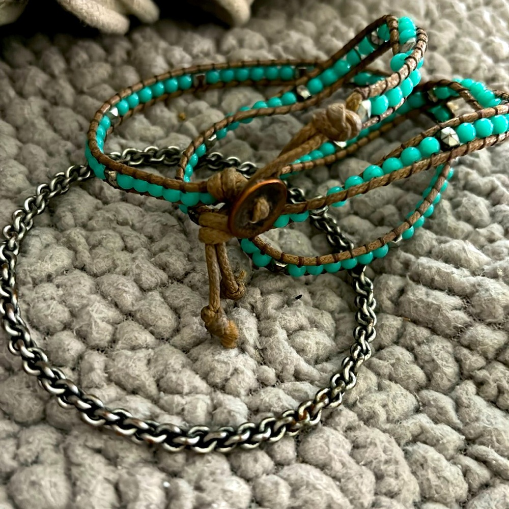 Turquoise wrap bracelet and silver colored bangle. Costume jewelry